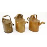 Three wood grain decorated hot water carriers G+