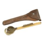 A boxwood and brass horse measuring tape by COOPER W. JONES in orig leather pouch, lacks brass tip