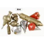 Four brass and four steel plumb bobs G