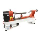 An AXMINSTER Hobby Series woodworking lathe No AH1218 240v Pat tested with a CLUBMAN Super Precision