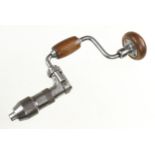 An unusually small ratchet brace by J.A.CHAPMAN Sheffield with mahogany head and handle G+