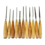 Seven very slender bevel edge chisels 1/8" to 1/4" and 4 similarly slender mortice chisels 1/16"