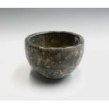 From the earliest days of the Leach Pottery, St Ives A Raku tea bowl on a clay squashed roll foot