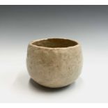 From the earliest days of the Leach Pottery, St Ives A Raku tea bowl Impressed pottery seal and