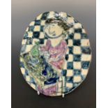 Dora HOLZHANDLER (1928-2015)Potter at the WheelPainted ceramic plaqueSigned Further signed and dated