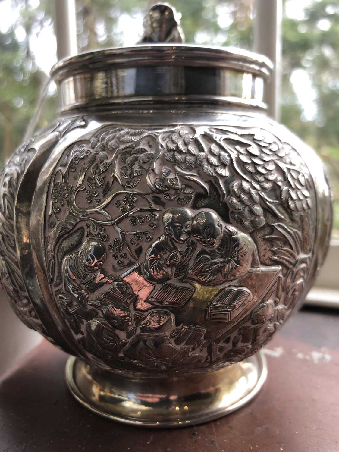 A Chinese silver globular tea caddy, the body with four shaped panels enclosing garden scenes - Image 9 of 12