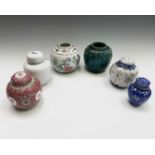 A blue and white miniature ginger jar, cover and internal lid, decorated with prunus, height 10cm,