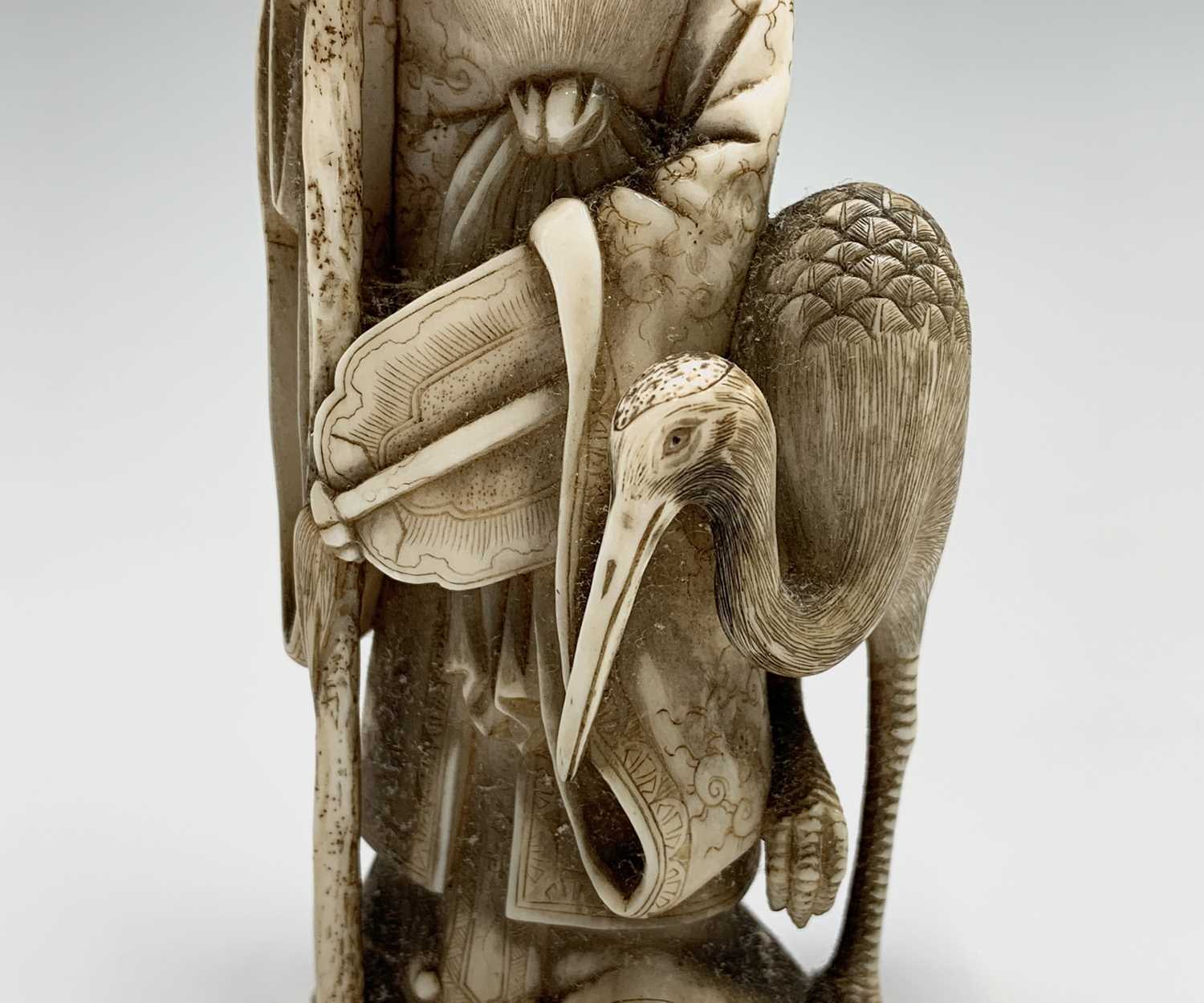 A Chinese carved ivory figure of Shouxing, 19th century, character marks, with staff in hand - Image 5 of 7