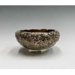 A Chinese silver chrysanthemum decorated bowl, signed, height 5cm, diameter 9.5cm, weight 125.9