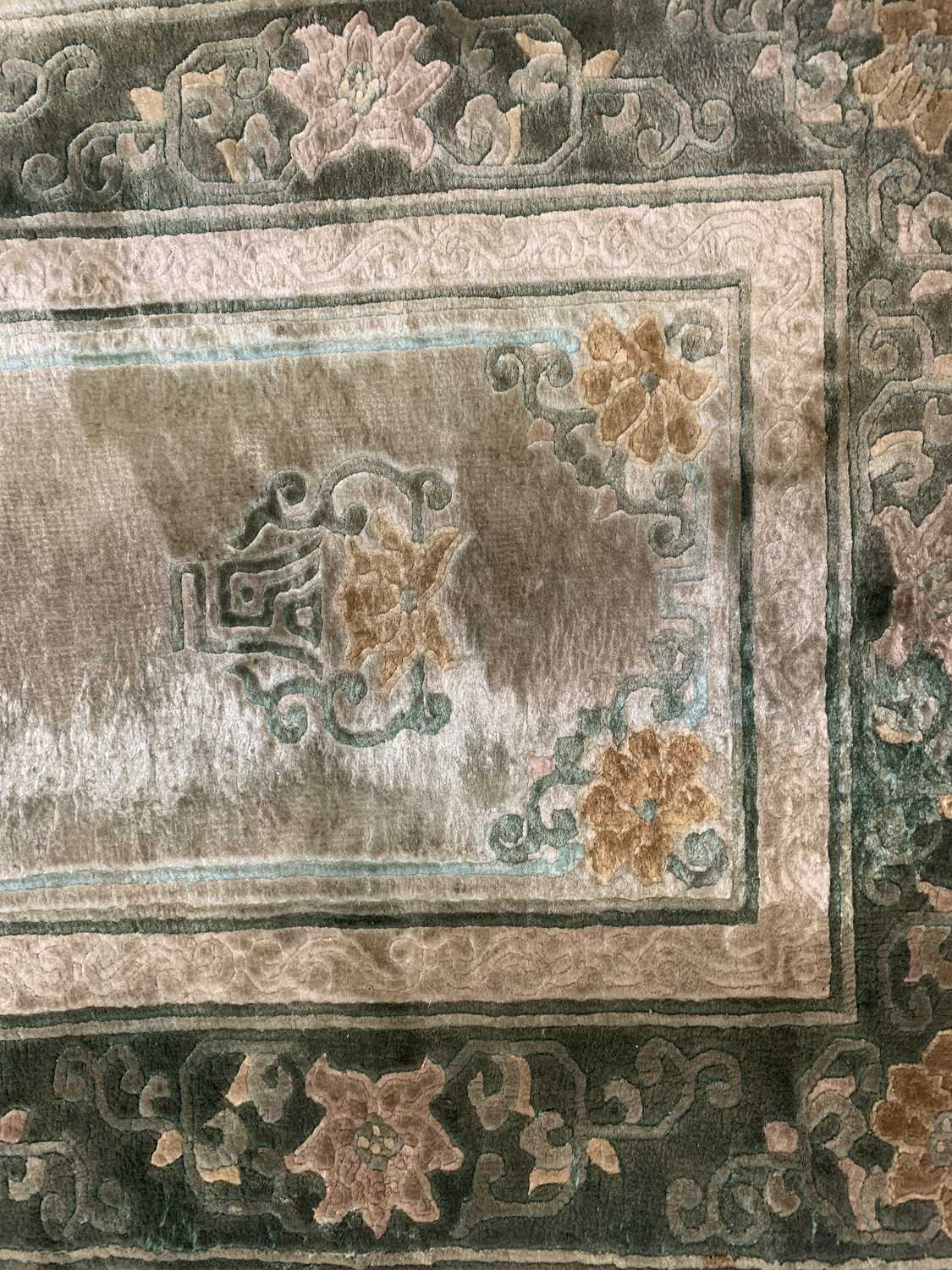 Two Chinese silk rugs, 126 x 62cm and 122 x 62cm and a Chinese woollen mat, 55 x 120cm. - Image 4 of 8