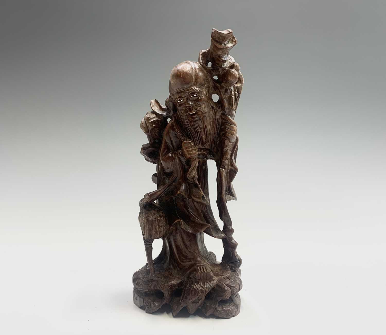 A Chinese hardwood figure of Shoulao, holding a peach and a staff, height 21cm, together with four - Image 4 of 13