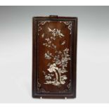 A Chinese rosewood and mother of pearl inlaid rectangular panel, calligraphy to verso including