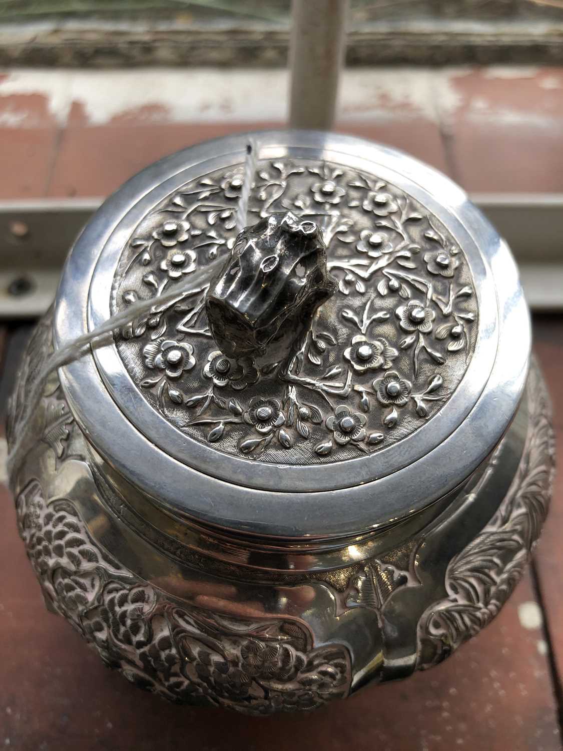 A Chinese silver globular tea caddy, the body with four shaped panels enclosing garden scenes - Image 11 of 12