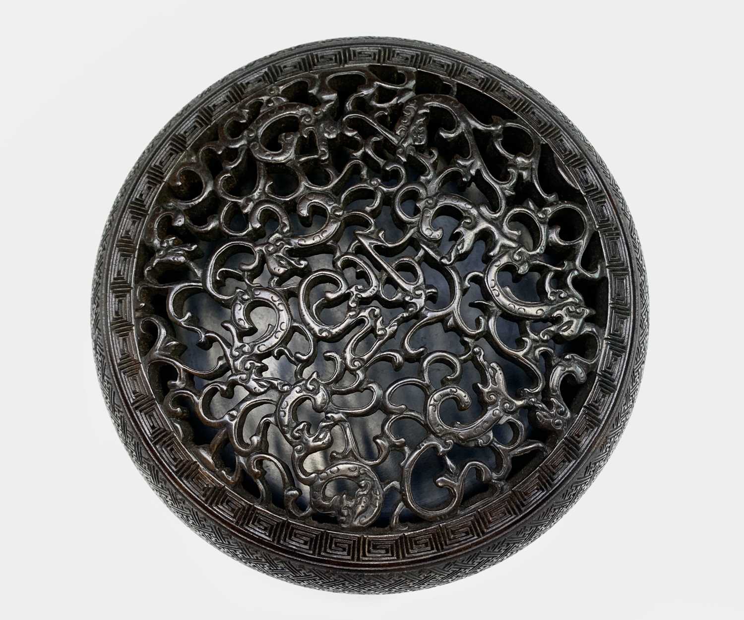 A Chinese Zitan wood circular box and cover, 18th century, the pierced cover carved with nine - Image 14 of 25