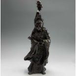 A Chinese bronze figure of Guanyin, 19th century, later converted to a lamp, overall height 42cm.