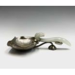 A Chinese jade and silver spoon, the bowl in the fom of a lotus flower inhabited with two frogs, the