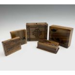 Five Jerusalem olive wood boxes, to include a stamp box and two card cases, largest width 13cm.