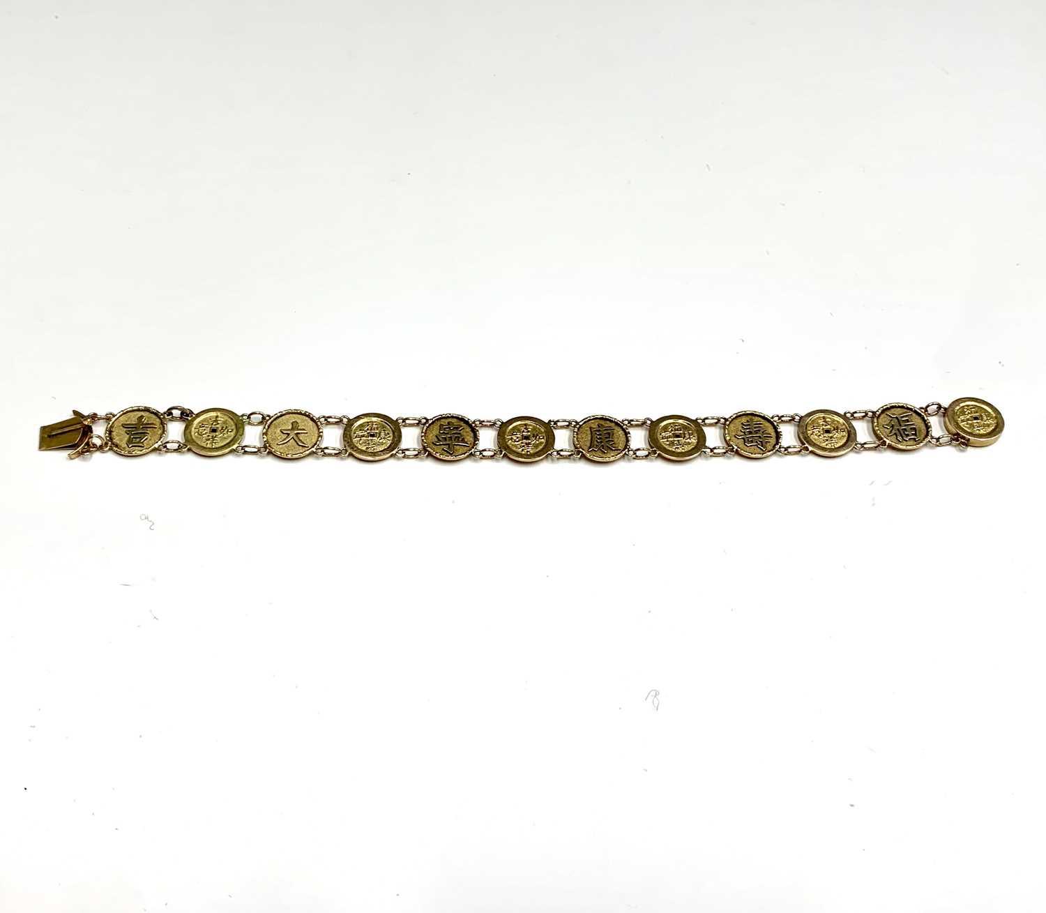 A Chinese gold bracelet with twelve 'cash' links, length 19.5cm, weight 12.5 grams.Condition report: - Image 7 of 7