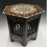 A Damascus hardwood octagonal occasional table, Syria, circa 1880, with mother of pearl and bone