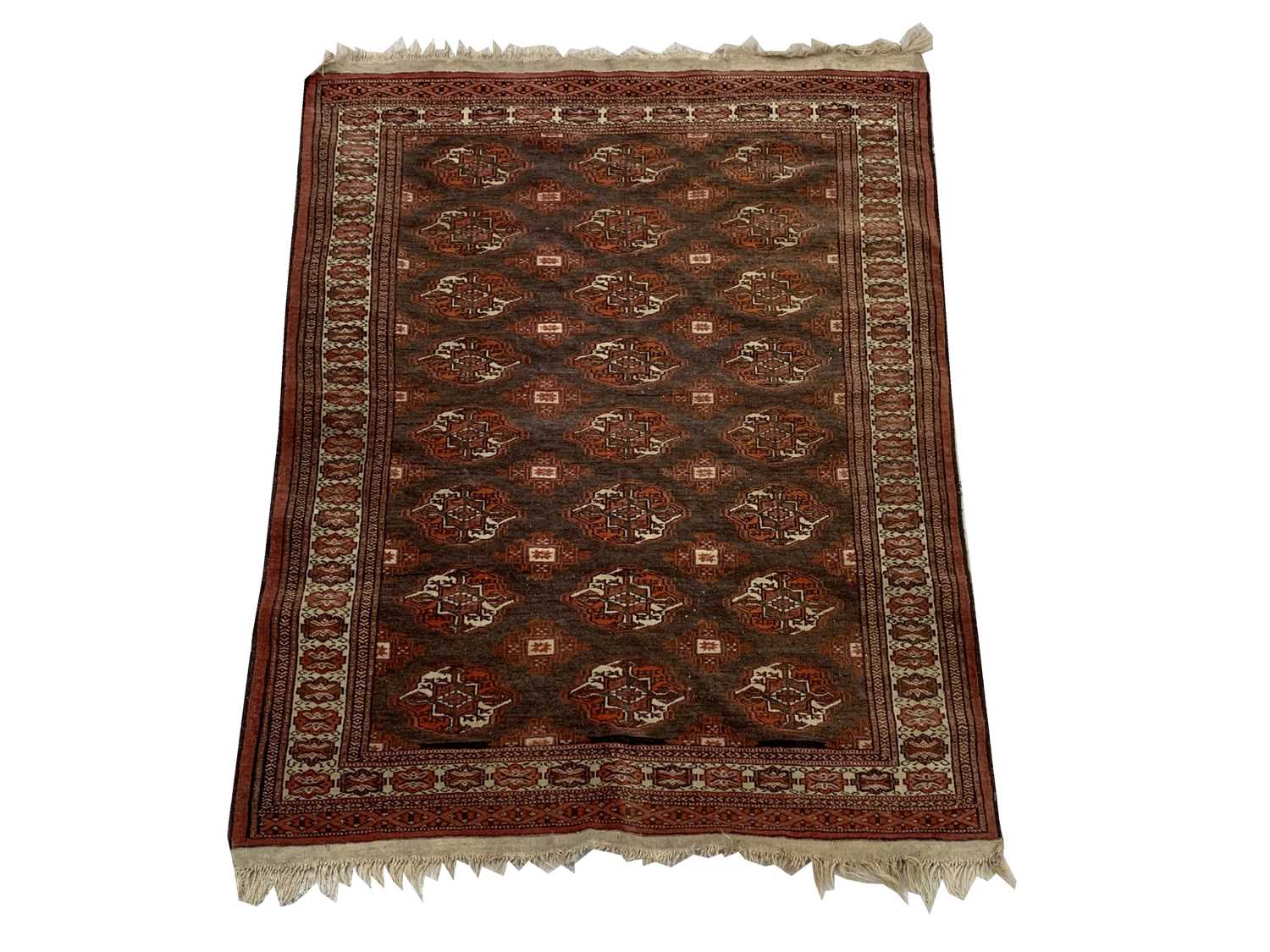 A Bokhara rug, early 20th century, the brown field with eight rows of three medallionsand rows of