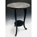 A Japanese carved stained wood occasional table, early 20th century, probably retailed at Liberty,