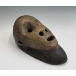 An unusual carved wood tribal face mask, 18th/19th century, 34 x 20cm.