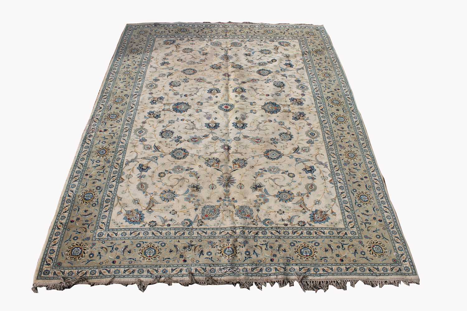 A Kashan carpet, Central Persian, signed cartouche to one end, the ivory field with all over