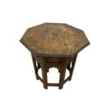 An Hoshiarpur octagonal folding occasional table, Northern India, 19th century, with inlaid brass