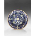 A Chinese porcelain bowl, 19th century, the painted blue enamels to the interior decorated with