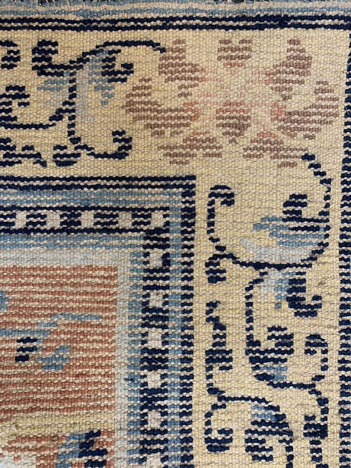 A Chinese carpet, 19th century, the camel field with rows floral sprays, within a saffron - Image 3 of 22