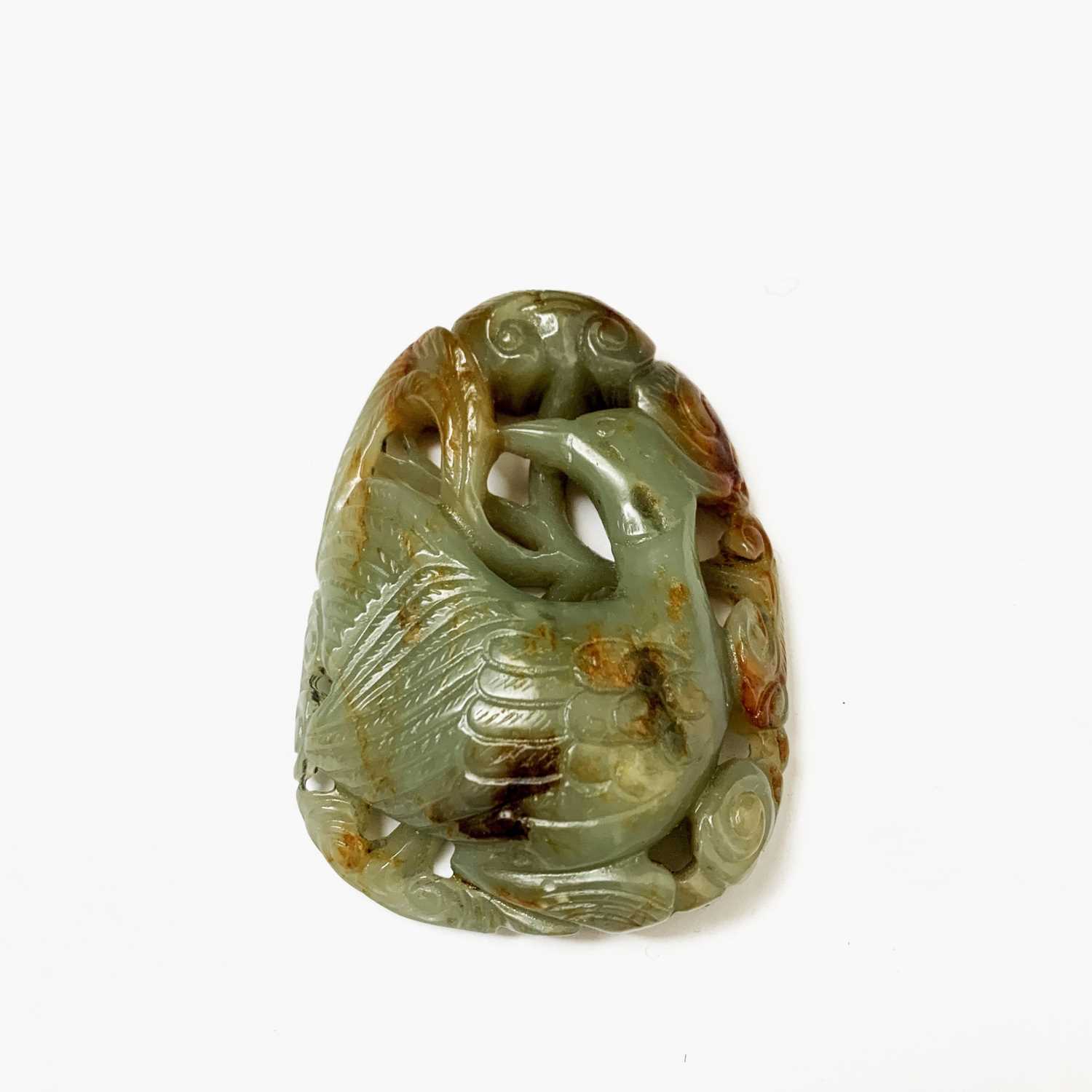A Chinese carved & reticulated celadon jade ornament, depicting a bird & lingzhi, with russet - Image 11 of 14