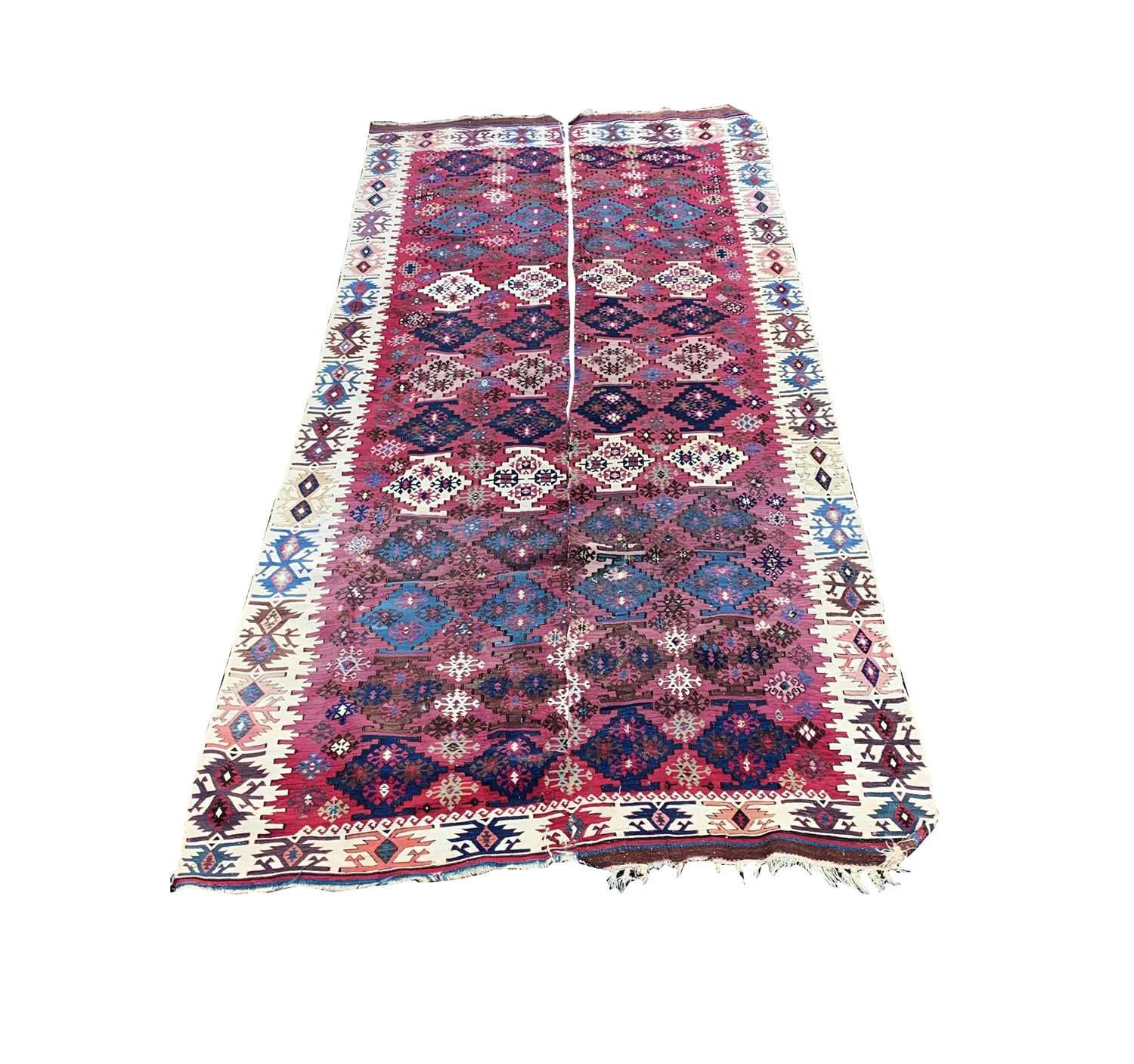An Aleppo kelim, South East Anatolia, late 19th century, the madder field with thirteen rows of four