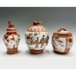 A Japanese Kutani porcelain jar and cover and two vases,19th century, each with red character marks,
