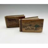 Two albums entitled 'Flowers and Views of the Holy Land', with olive wood covers, inscribed '