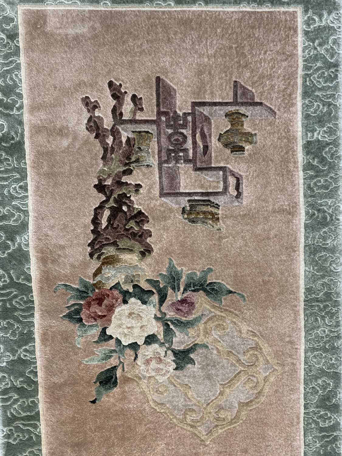Two Chinese silk rugs, 126 x 62cm and 122 x 62cm and a Chinese woollen mat, 55 x 120cm. - Image 5 of 8