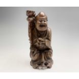 A Chinese carved hardwood figural lamp base, height 29cm.