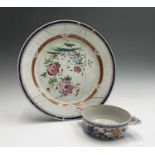 A large Chinese famille rose charger, 18th century, diameter 38.5cm and a Chinese porcelain dish,