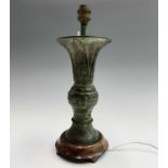 A Chinese archaic style bronze gu vase, converted to a lamp, height 36cm, height of vase 24.5cm,