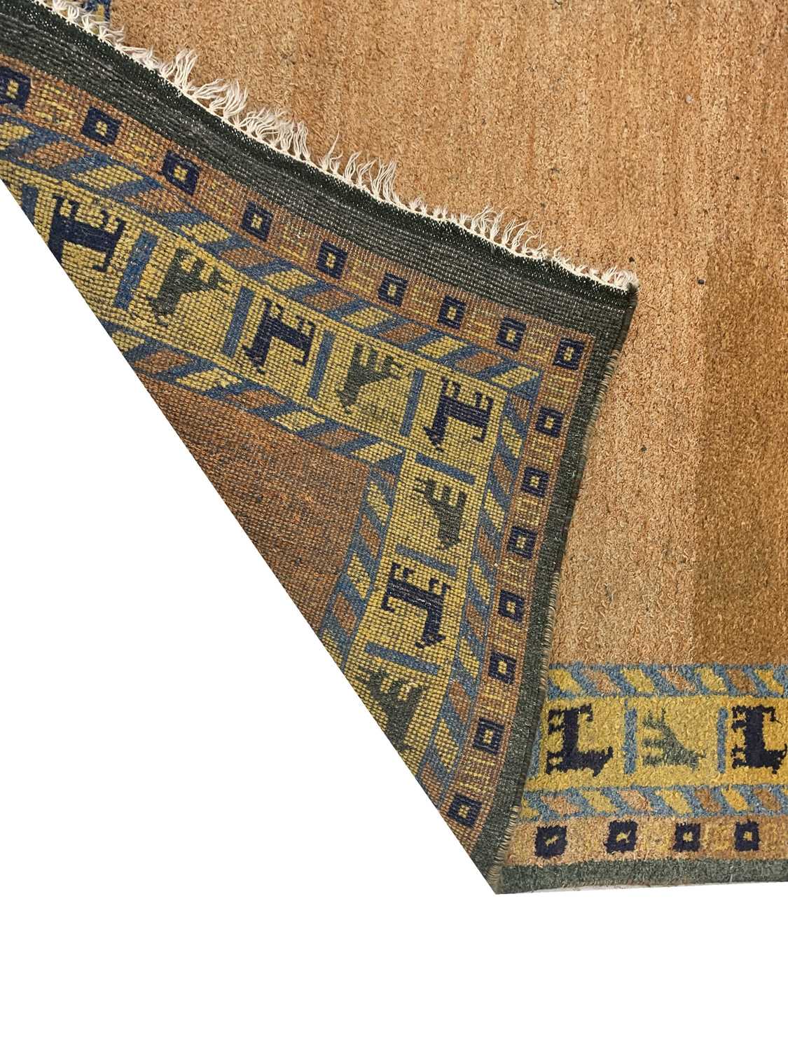 A Gabbeh carpet, the palin abrash field within a yellow broder filled with stylised animals, 272 x - Image 4 of 4