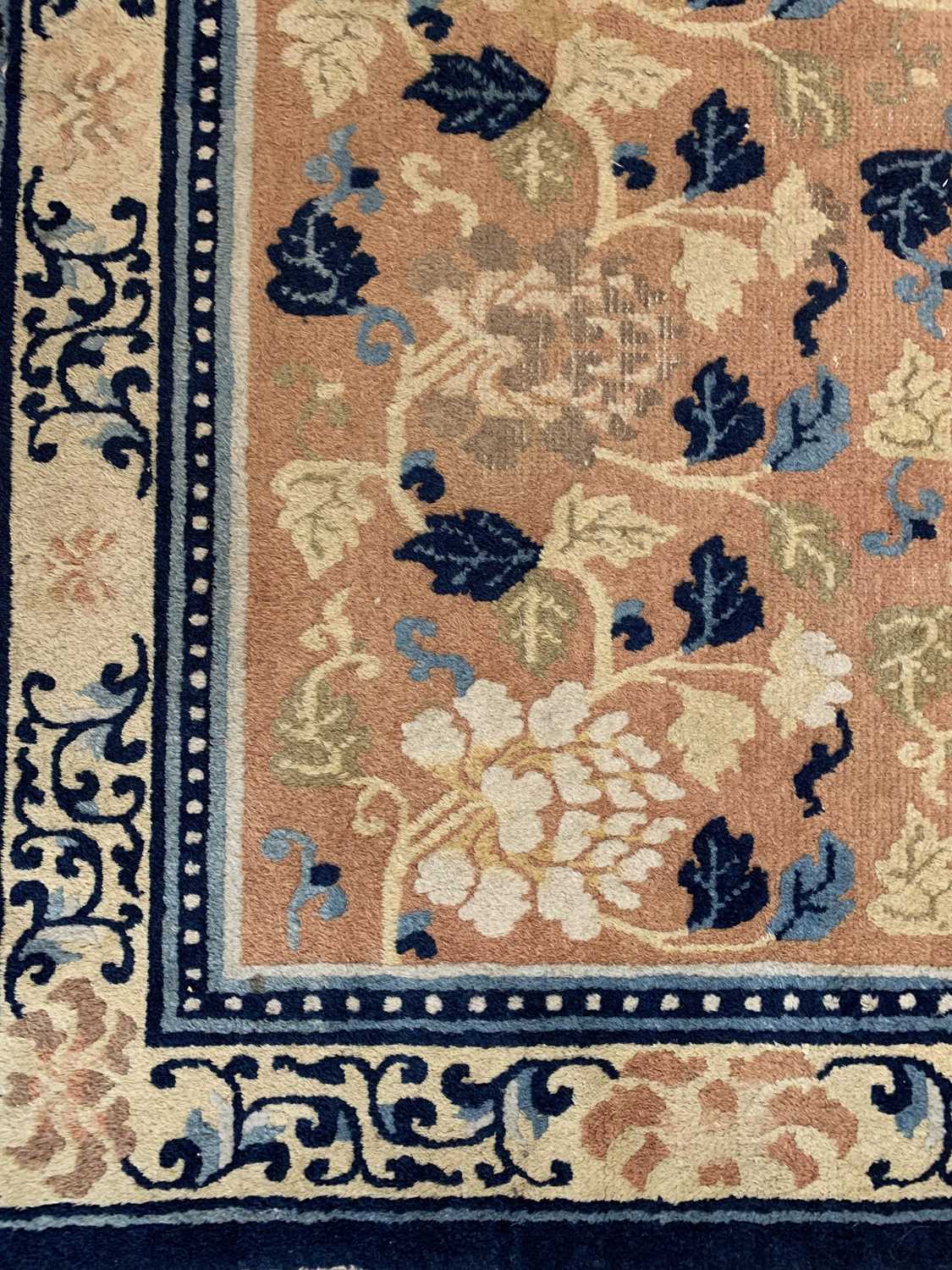 A Chinese carpet, 19th century, the camel field with rows floral sprays, within a saffron - Image 5 of 22