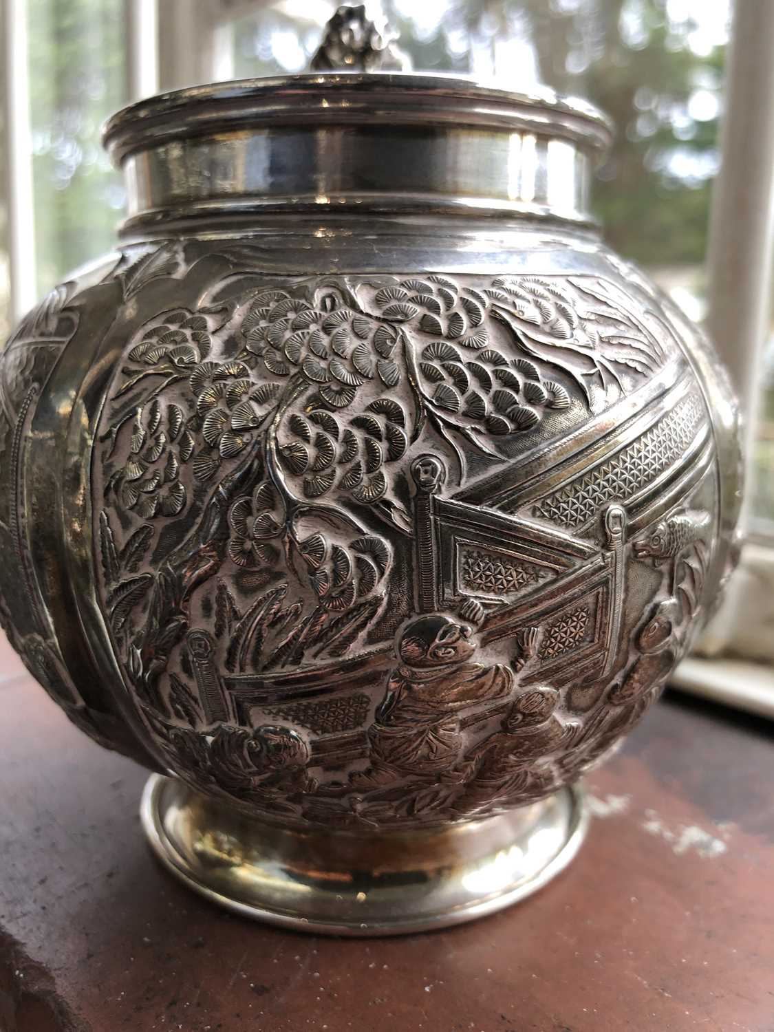 A Chinese silver globular tea caddy, the body with four shaped panels enclosing garden scenes - Image 6 of 12