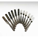 A set of six Chinese silver dessert knives and forks, the prongs with impressed character mark and