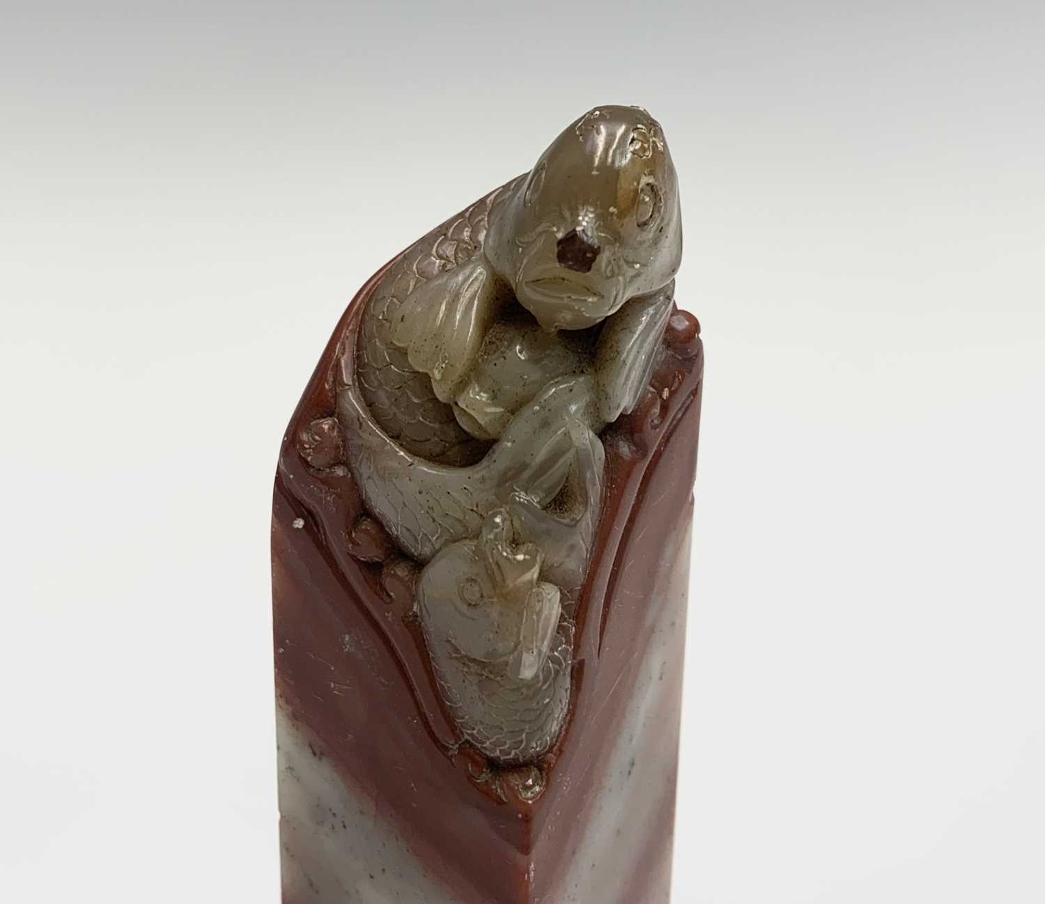 A Chinese hardstone seal, 19th century, surmounted by a carved carp, height 7.5cm. - Image 3 of 7