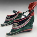 A pair of Chinese silk embroidered lotus shoes, early 20th century, length 13.5cm.Condition