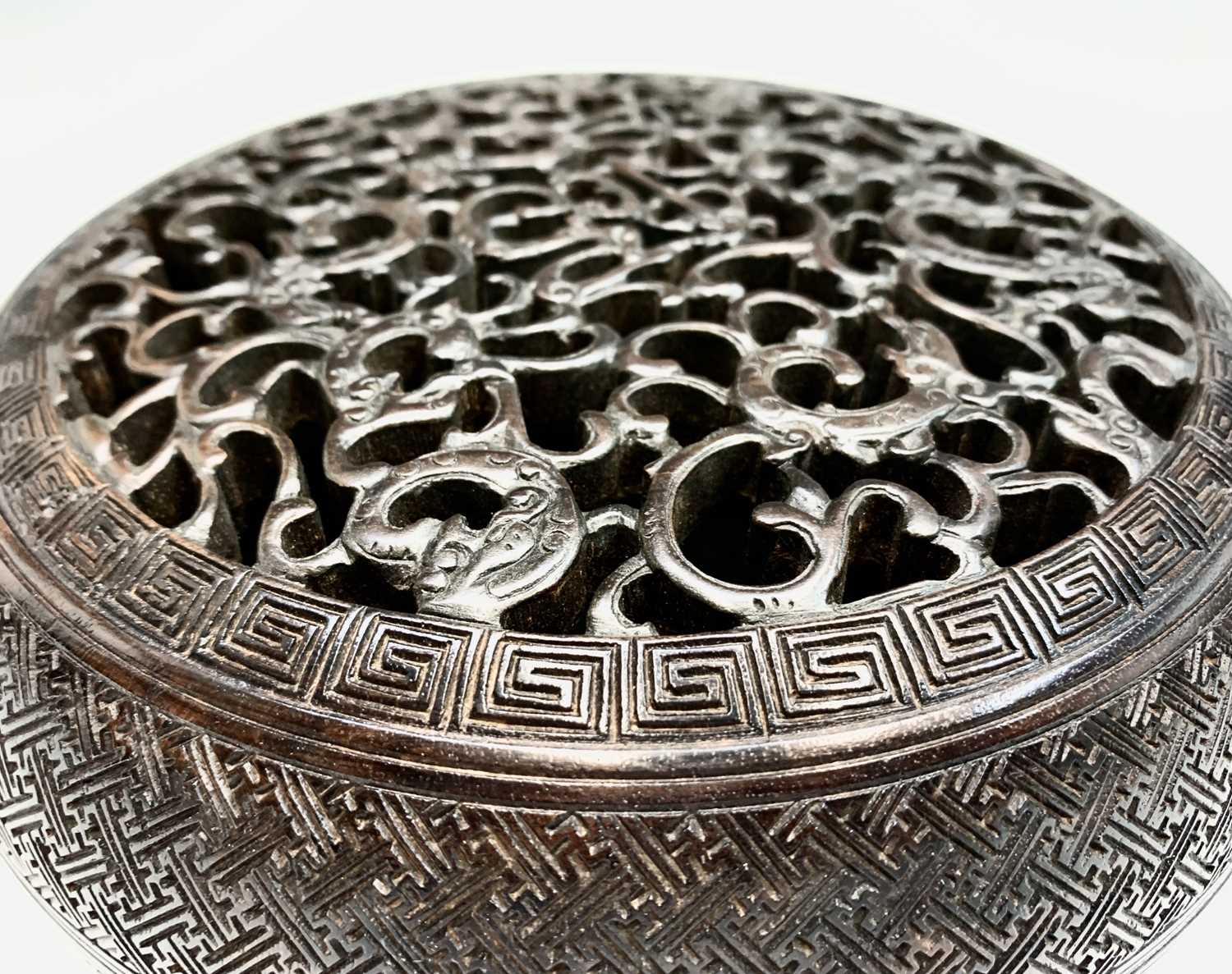 A Chinese Zitan wood circular box and cover, 18th century, the pierced cover carved with nine - Image 7 of 25