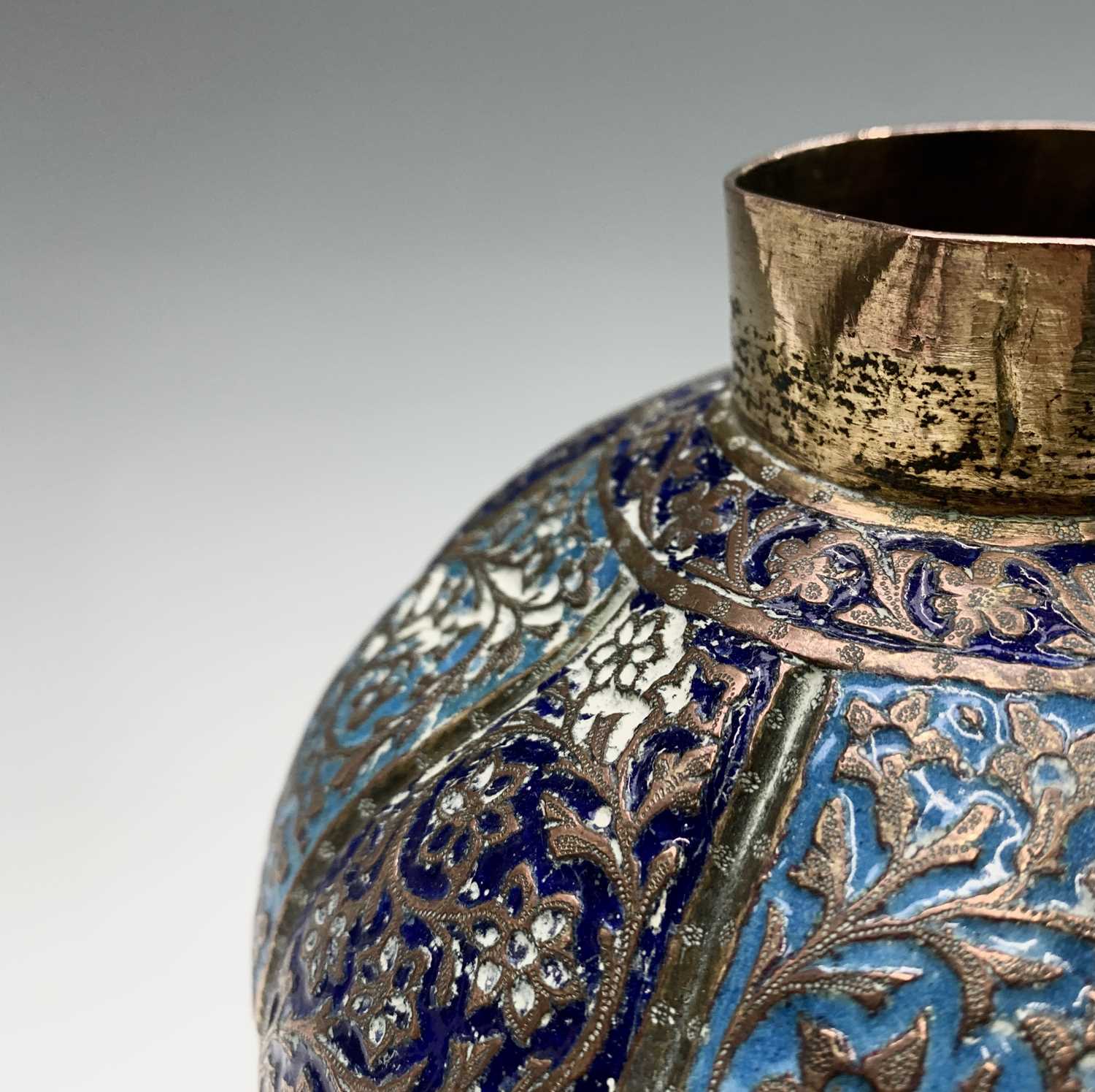 A Persian enamelled copper vase and cover, 19th century, the navy and sky blue panels each enclosing - Image 6 of 9