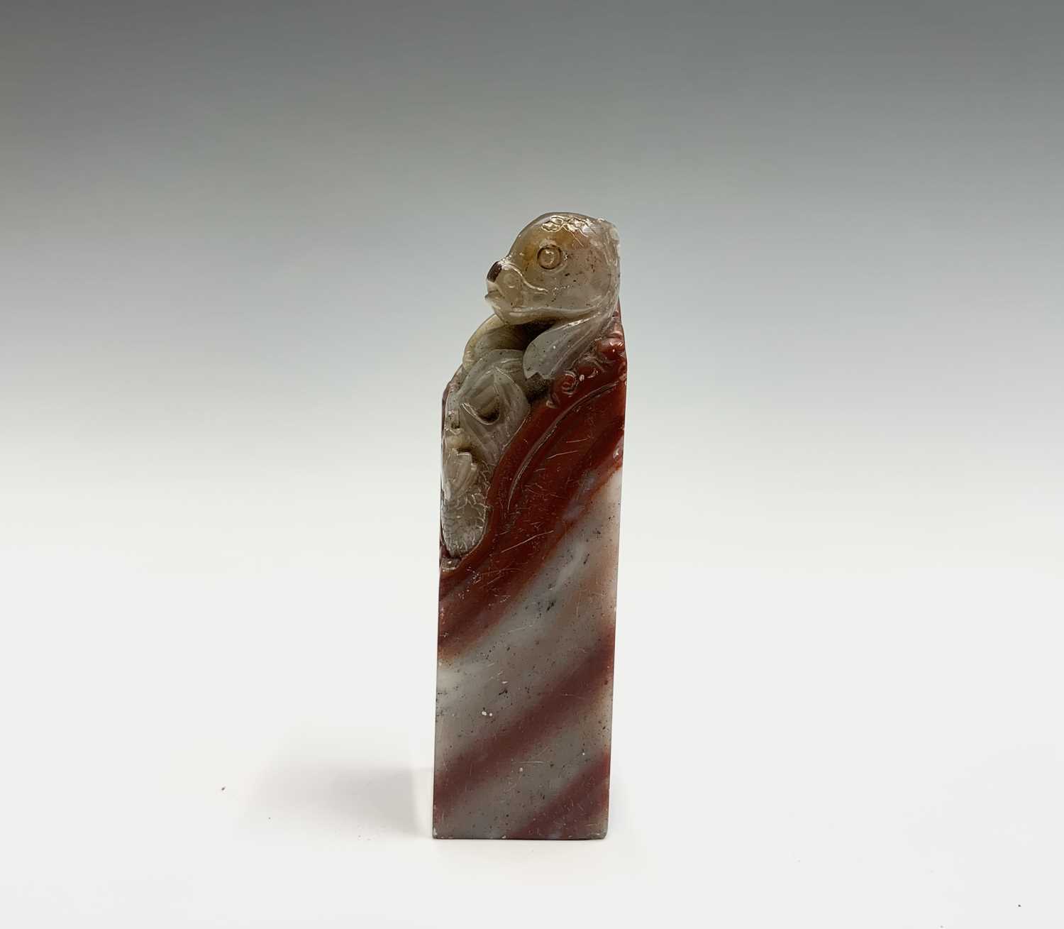 A Chinese hardstone seal, 19th century, surmounted by a carved carp, height 7.5cm. - Image 2 of 7