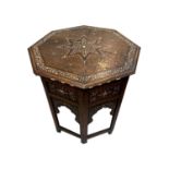 A Hoshiarpur folding octagonal occasional table, Northern India, circa 1880, inlaid with bone and