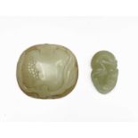 A Chinese jade carving of a pomegranate, 7 x 7.5cm and another jade carving, 5.2 x 3.3cm.