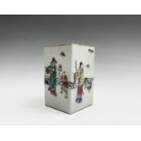 A Chinese famille rose porcelain square brush pot, 19th century, the garden scene with figures,